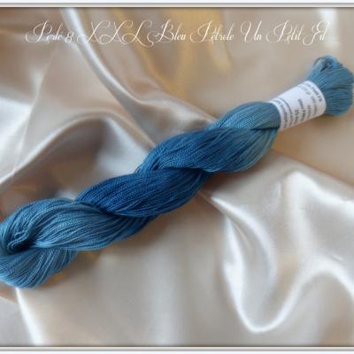 Perles 8 xxl bleu petrole un petit fil