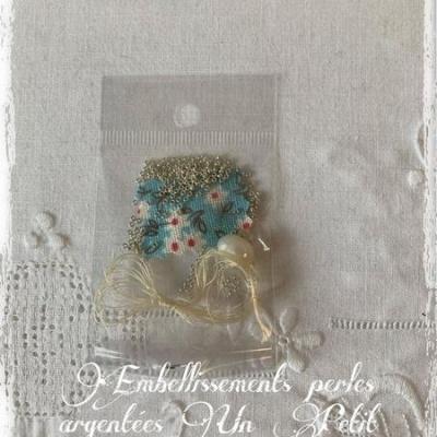 Perles argentees embellisements un petit fil