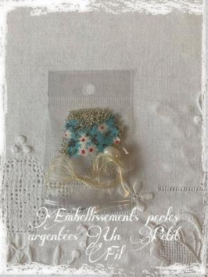 Perles argentees embellisements un petit fil